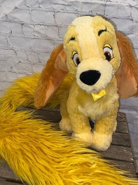 Disney Parks Lady Plush Dog with Super Long Tail